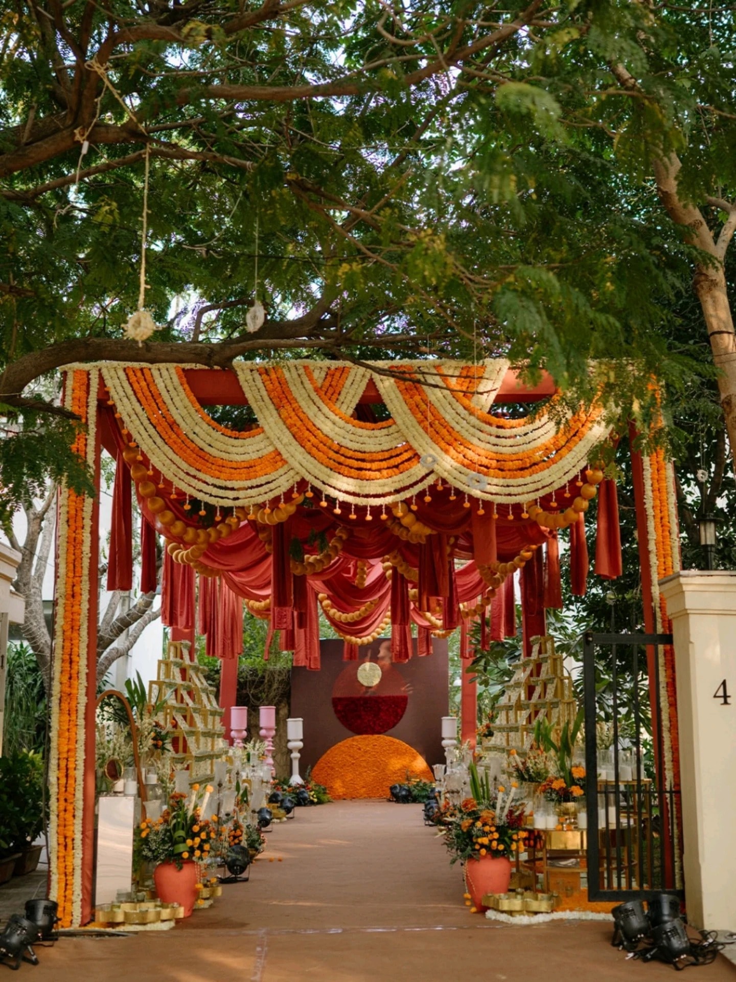 Garba Nights decor in red and marigold